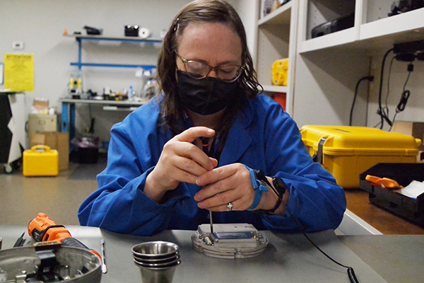 technician for egps solutions disassembling a gnss receiver